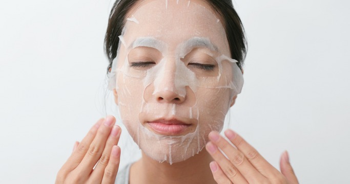 Apply sheet mask How To Perform A Gua Sha Facial Massage At Home 1