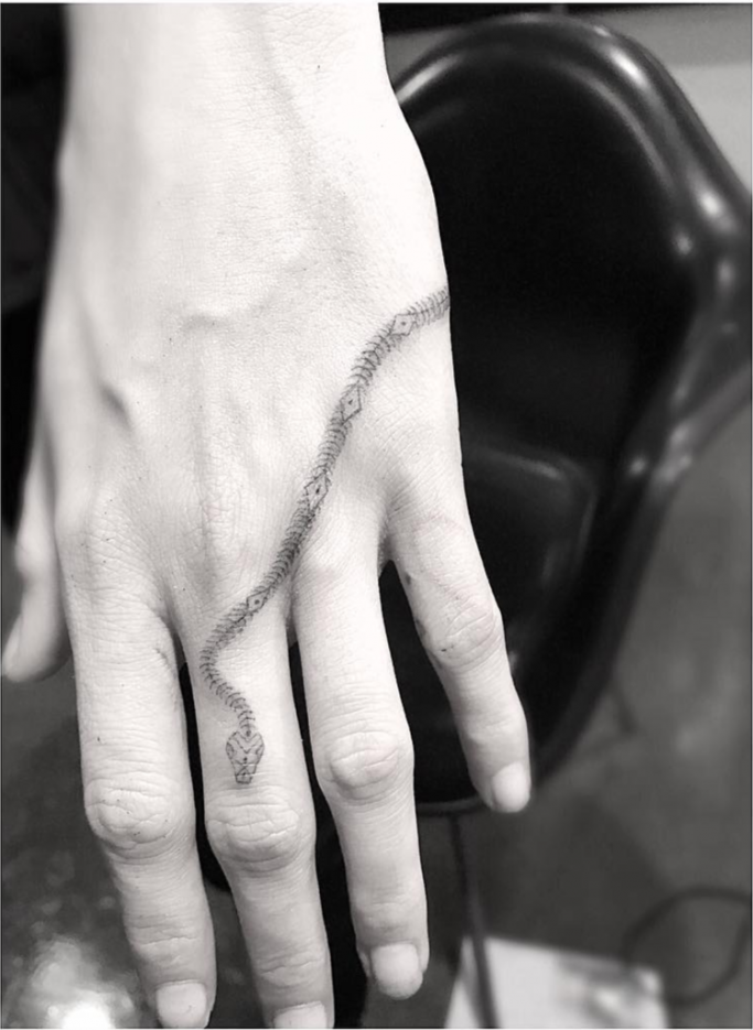 Cara Delevigne snake tattoo Cara Delevigne snake tattoo