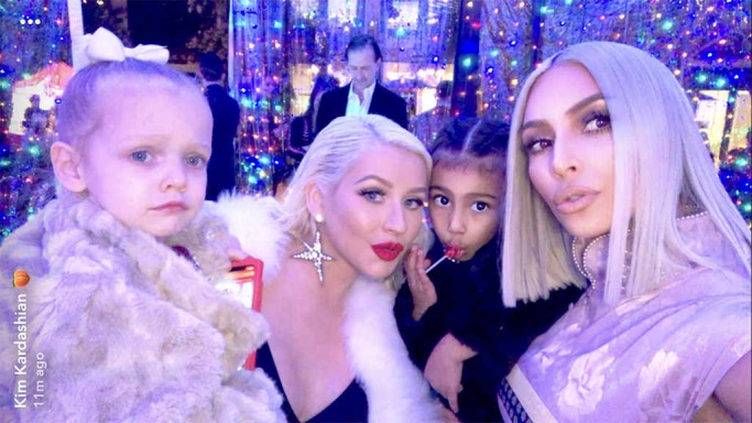 Kim Kardashian and Christina Aguilera with their daughters