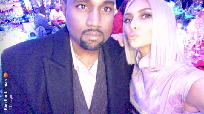 Kim and Kanye West at the Kardashian Christmas Eve Party