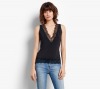 Hush Black Peek A Boo Top, £35/AED156.85; Holly Cropped Jeans, £65/AED291.29