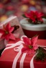 Poinsettias can make the finishing touches to presents