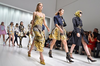 michael kors acquires versace